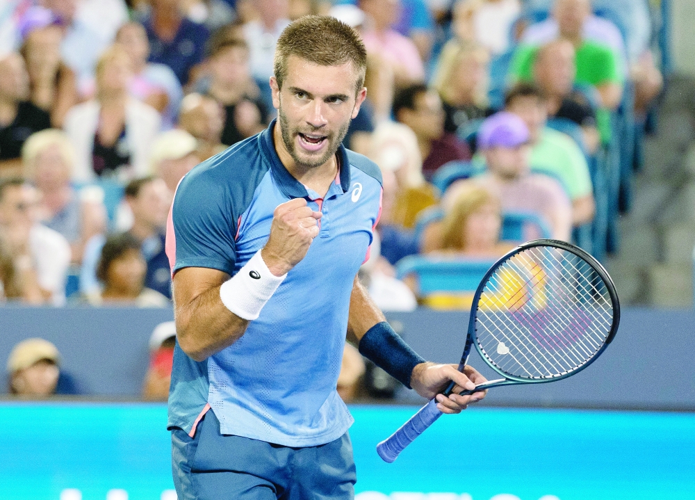 Borna Coric (CRO) reacts to a point against Rafael Nadal (ESP) during the Western & Southern Open at the Lindner Family Tennis Center. -- USA TODAY Sports
