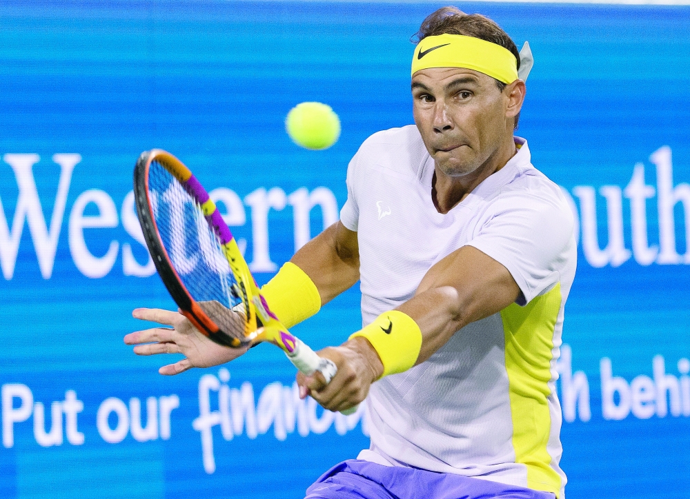 Rafael Nadal (ESP) returns a shot against Borna Coric (CRO) during the Western & Southern Open at the at the Lindner Family Tennis Center. -- USA TODAY Sports
