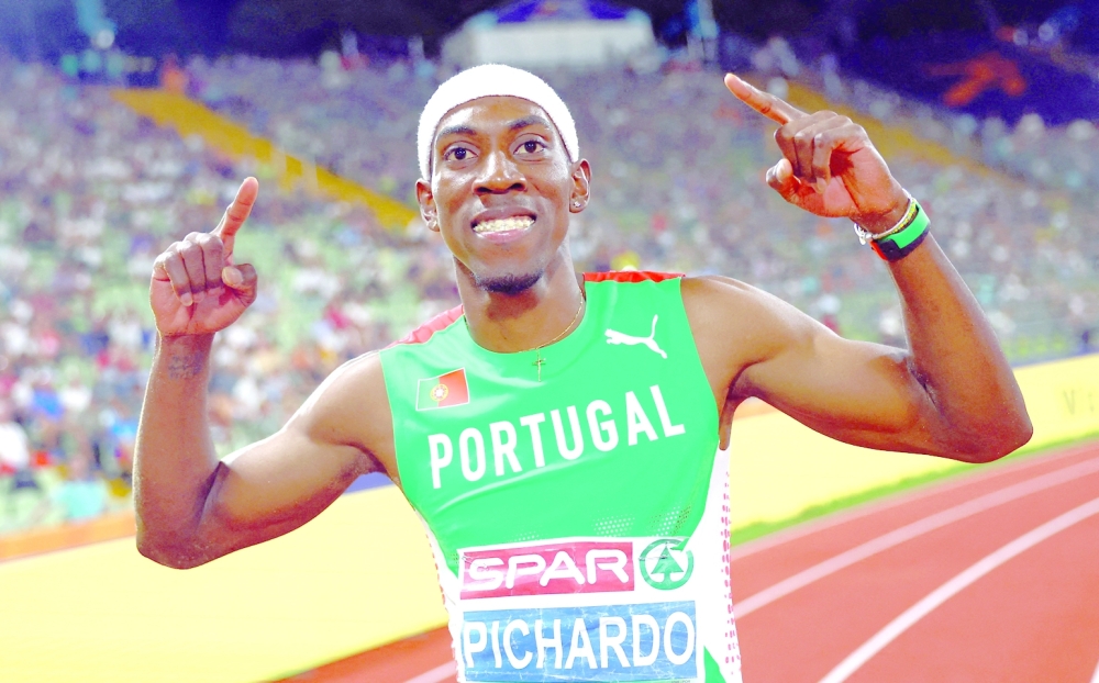 Portugal's Pedro Pichardo celebrates after winning the men's triple jump final at European Championships - Olympiastadion, Munich, Germany. -- Reuters