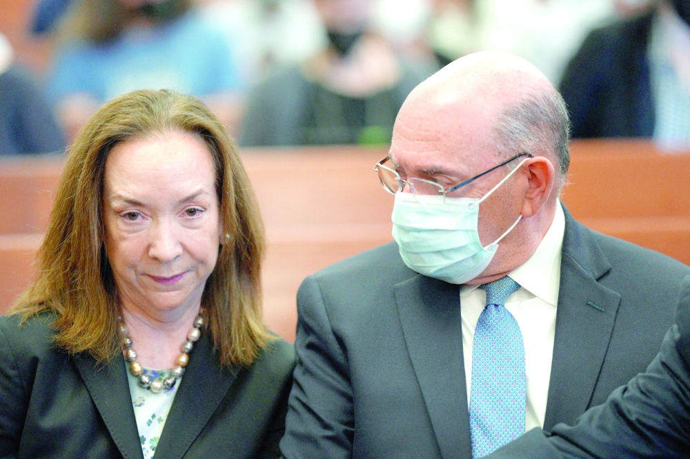 Former Trump CFO Allen Weisselberg sits with his lawyer in the courtroom in Manhattan Supreme Court on Thursday in New York City. -- AFP