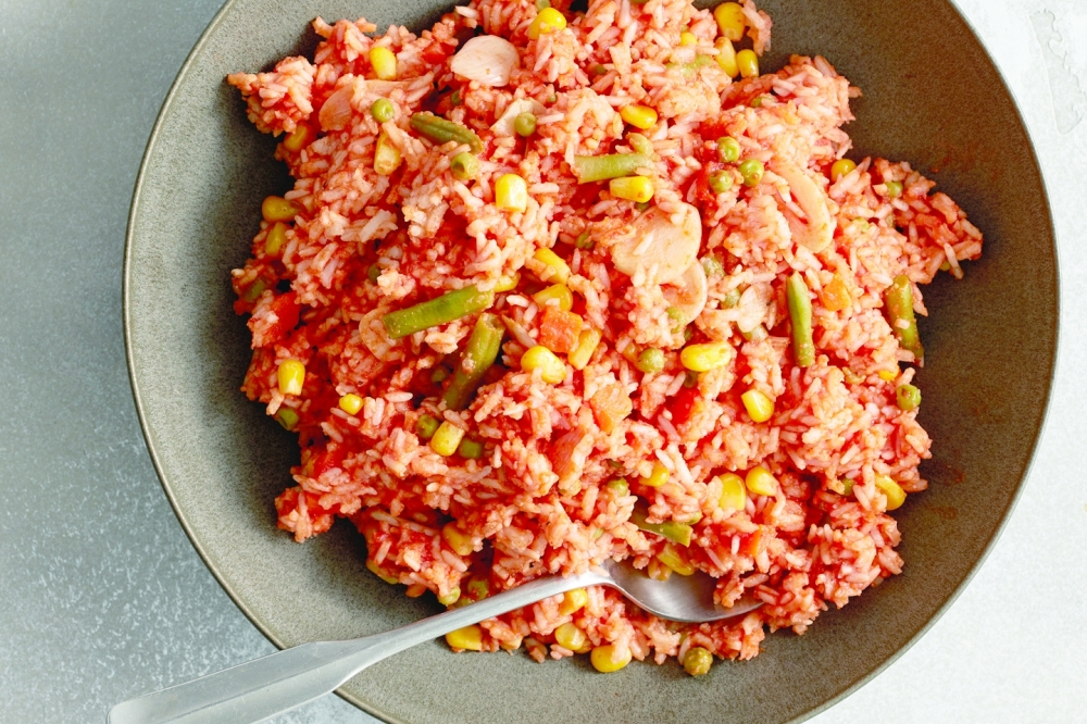 Arroz rojo (red rice) in New York, July 28, 2022. Food styled by Sue Li. (Johnny Miller/The New York Times)