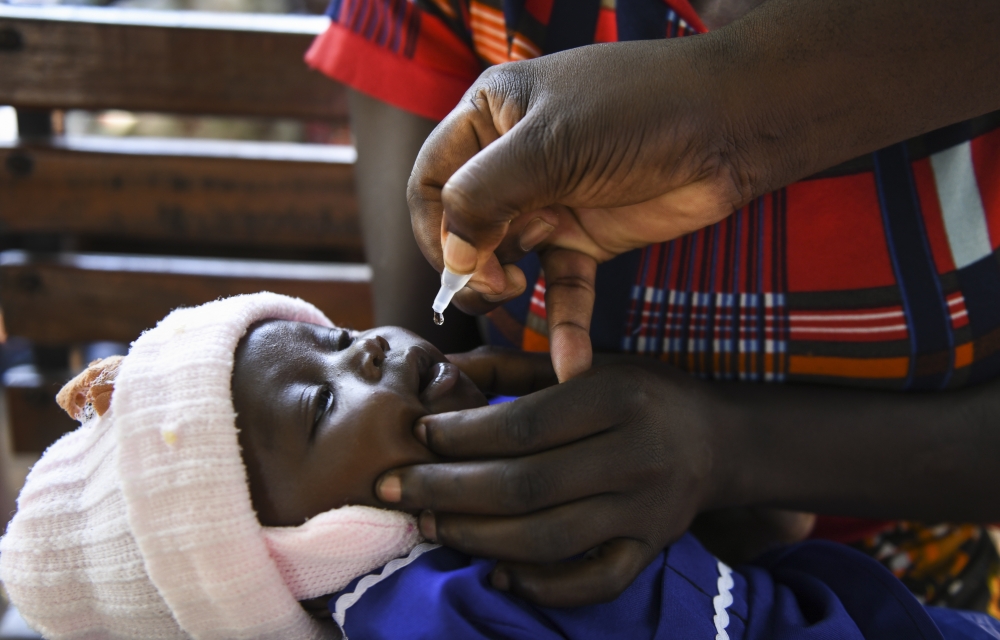 Charles Bizimaki administers a polio vaccine at the Makhwira Health Center in Chikwawa, Malawi, April 14, 2022. (Thoko Chikondi/The New York Times) 