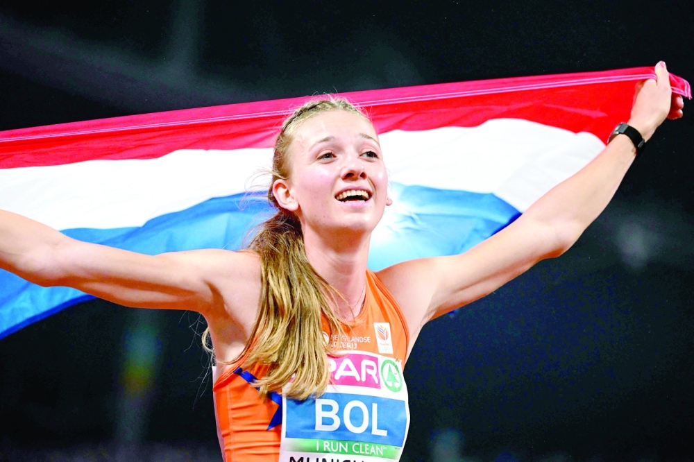 Netherlands' Femke Bol celebrates winning the women's 400m Hurdles final during the European Athletics Championships at the Olympic Stadium in Munich, southern Germany on August 19, 2022.  (Photo by INA FASSBENDER / AFP)

