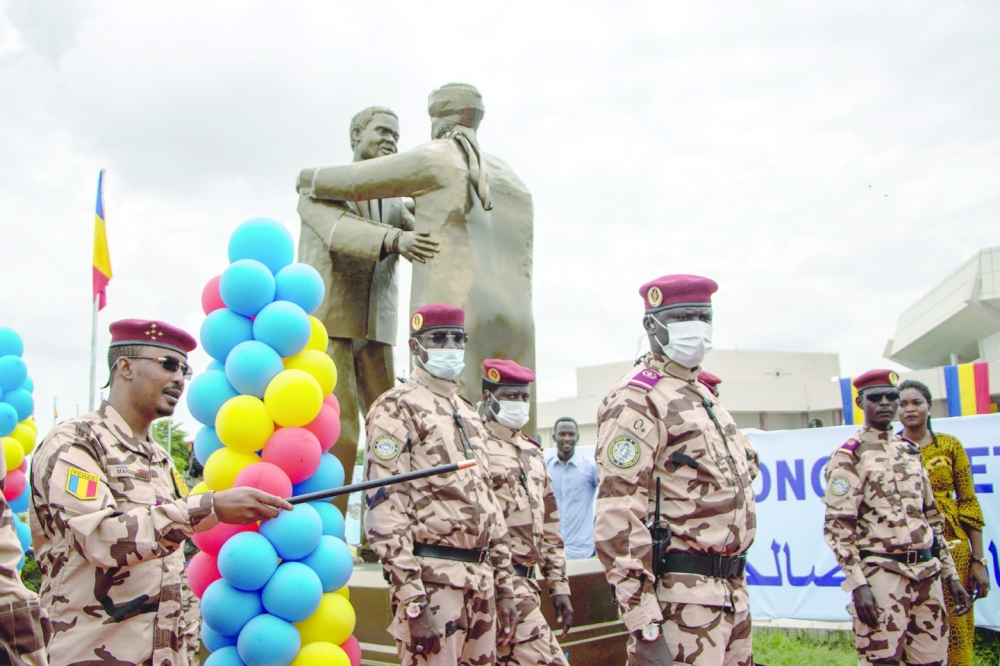 Chad's transitional President Mahamat Idriss Deby (L) inaugurates the statue of peace, forgiveness and reconciliation at the January 15 Palace on the occasion of the opening ceremony of the dialogue, in N'Djamena on Saturday. - AFP