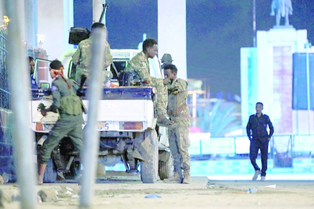 Security forces patrol near the Hayat Hotel after an attack by Al Shabaab militants in Mogadishu on Saturday. - AFP