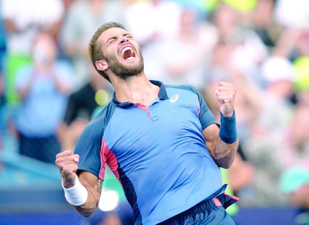 Aug 21, 2022; Cincinnati, OH, USA; Borna Coric (CRO) celebrates winning the men’s final match against Stefanos Tsitsipas (GRE) at the Western & Southern Open at the Lindner Family Tennis Center. Mandatory Credit: Susan Mullane-USA TODAY Sports
