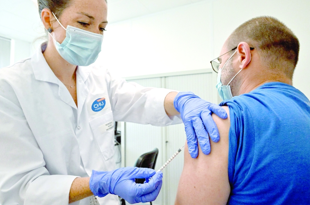 A nurse vaccinates a patient against monkeypox at a Centre gratuit d'information, in Montpellier, southern France. - AFP