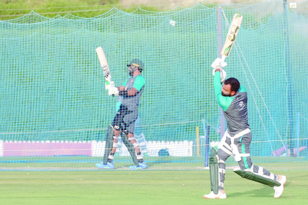 Pakistan's players attend a practice session ahead of their cricket match against India during the Asia Cup at the ICC Academy Ground in Dubai on August 25, 2022. (Photo by KARIM SAHIB / AFP)

