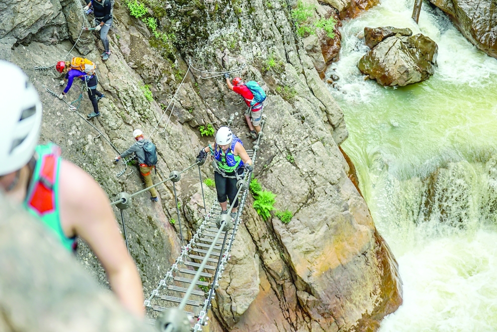 At the via ferrata in Ouray, Colo., the Sky Ladder spans 70 feet at a 33-degree angle. (San Juan Mountain Guides via The New York Times)
