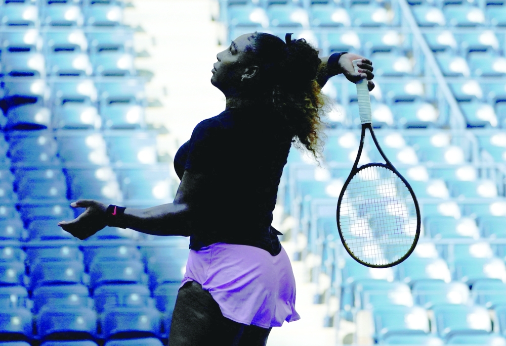 TOPSHOT - Serena Williams of the US practices on August 25, 2022 as she prepares for the 2022 US Open at the USTA Billie Jean King National Tennis Center in New York.  After a glittering 27-year professional career in which she became one of the greatest players of all time, Williams is preparing to bid farewell to tennis at the major where it all began. (Photo by TIMOTHY A. CLARY / AFP)