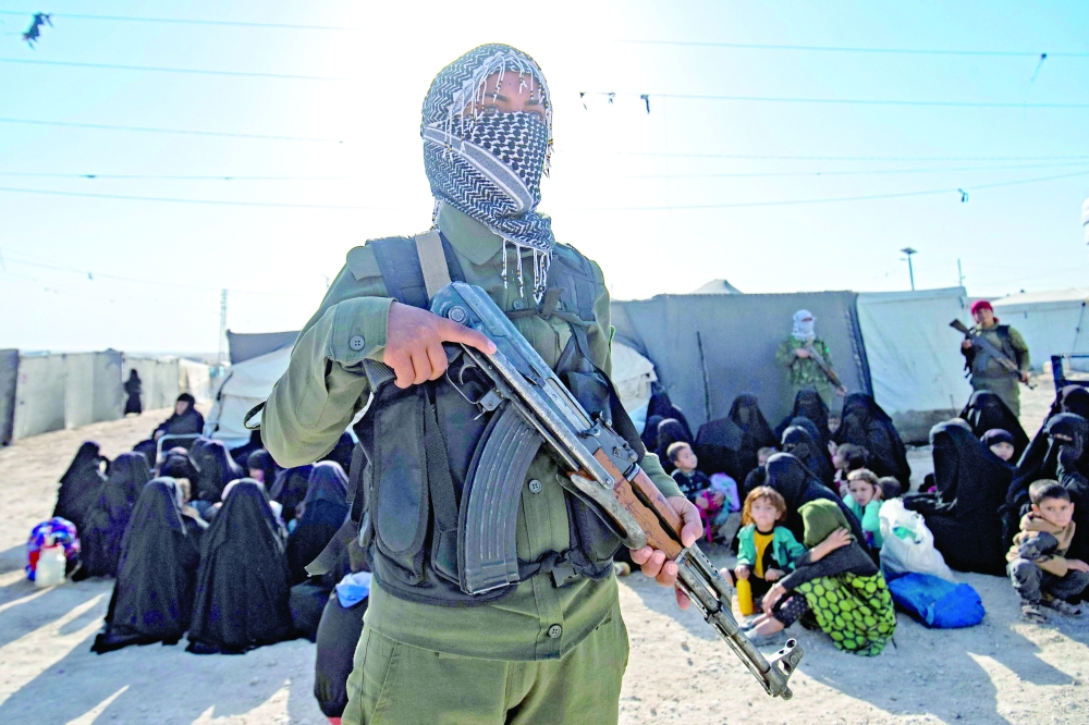 The Kurdish-run Al Hol camp during a security operation by the Kurdish Asayish security forces and the special forces of the Syrian Democratic Forces, on Friday. - AFP
