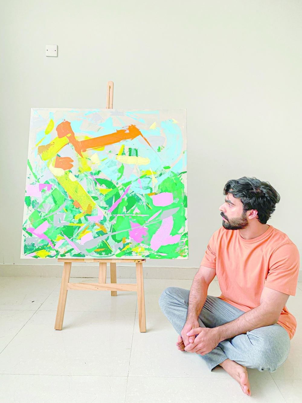 Majid Al Amri glance at his work