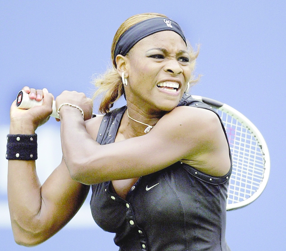 (FILES) In this file photo taken on September 05, 2004 Number 3 seed Serena Williams of the United States returns a shot to number 15 seed Patty Schnyder of Switzerland during their match at the  2004 US Open in Flushing Meadows,  New York AFP PHOTO    (Photo by Timothy A. CLARY / AFP)

