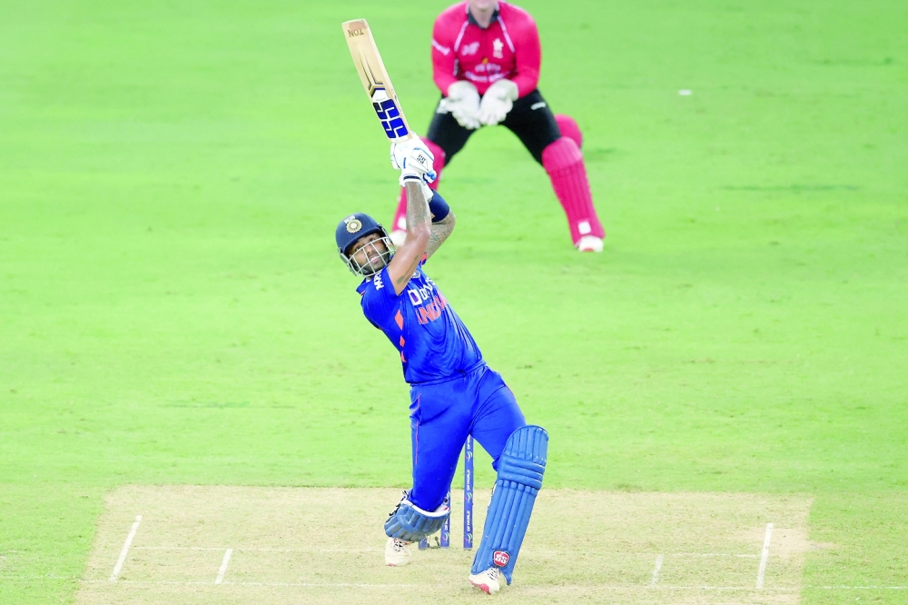 India's Suryakumar Yadav plays a shot during the Asia Cup Twenty20 international cricket match between India and Hong Kong at the Dubai International Cricket Stadium in Dubai on August 31, 2022. (Photo by KARIM SAHIB / AFP)

