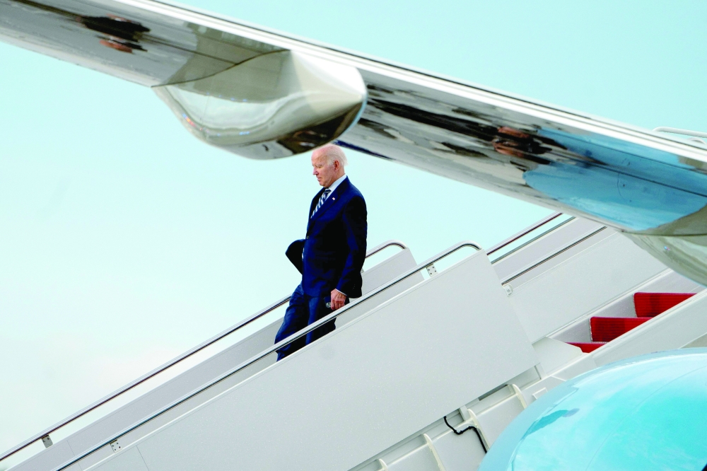 US President Joe Biden disembarks Air Force One at Joint Base Andrews in Maryland. - AFP