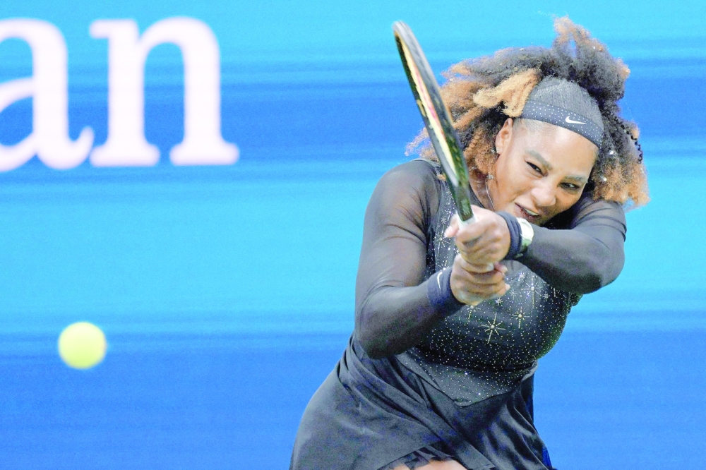 USA's Serena Williams hits a return to Estonia's Anett Kontaveit during their 2022 US Open Tennis tournament women's singles second round match at the USTA Billie Jean King National Tennis Center in New York, on August 31, 2022. (Photo by ANGELA WEISS / AFP)

