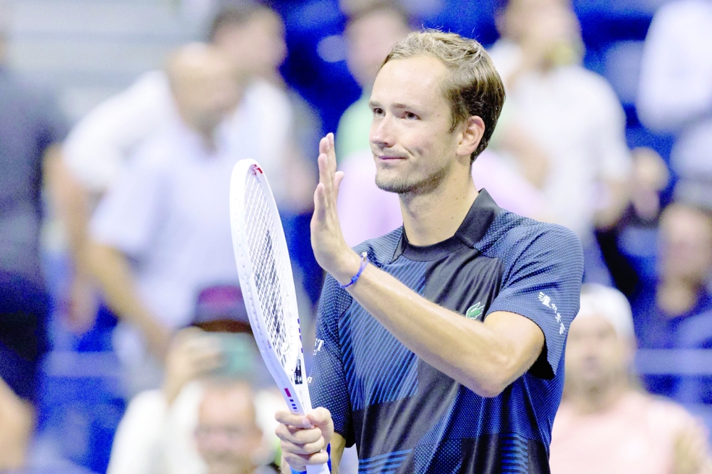 Russia's Daniil Medvedev celebrates his win against France's Arthur Rinderknech during their 2022 US Open Tennis tournament men's singles second round match at the USTA Billie Jean King National Tennis Center in New York, on August 31, 2022. (Photo by COREY SIPKIN / AFP)


