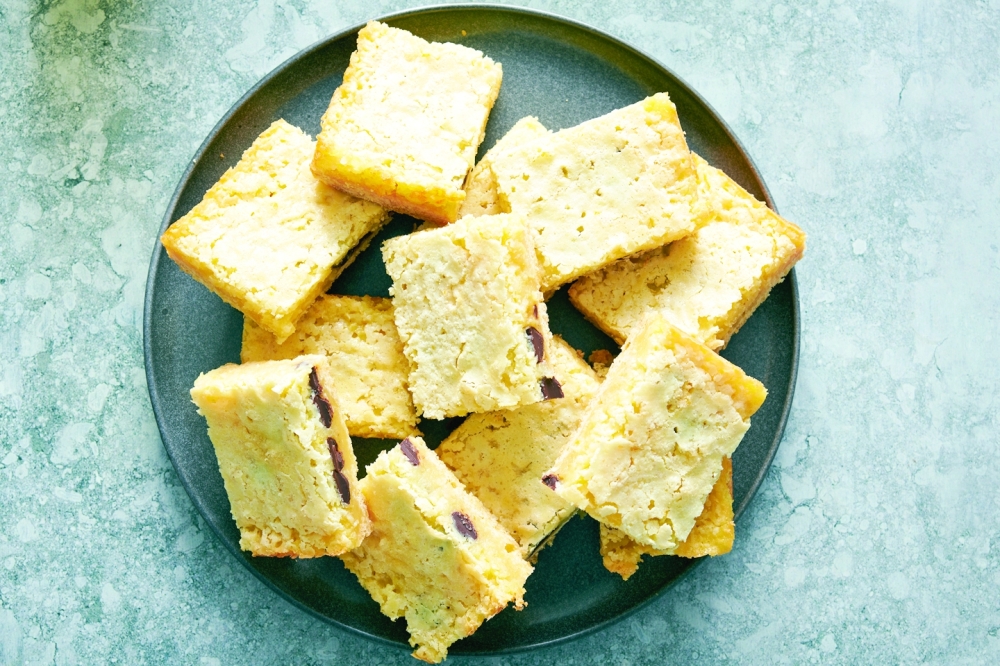 Coconut pie bars, in New York, Aug. 18, 2022. Food styled by Simon Andrews. (David Malosh/The New York Times)