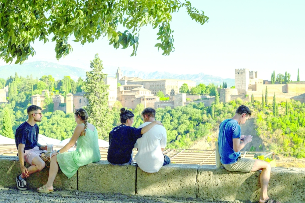 The crown of all Moorish castles is the magnificent Alhambra which hovers above the city like a mirage in Granda, Spain on Aug. 7, 2022. (Emilio Parra Doiztua/The New York Times)