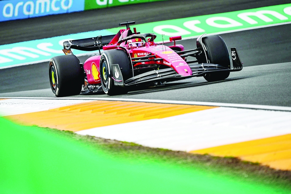 Ferrari's Monegasque driver Charles Leclerc steers his car during the first free practice session ahead of the Dutch Formula One Grand Prix at the Zandvoort circuit on September 2, 2022. (Photo by ANDREJ ISAKOVIC / AFP)