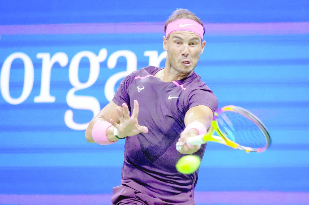 Spain's Rafael Nadal hits a return to France's Richard Gasquet during their 2022 US Open Tennis tournament men's singles third round match at the USTA Billie Jean King National Tennis Center in New York, on September 3, 2022. (Photo by COREY SIPKIN / AFP)

