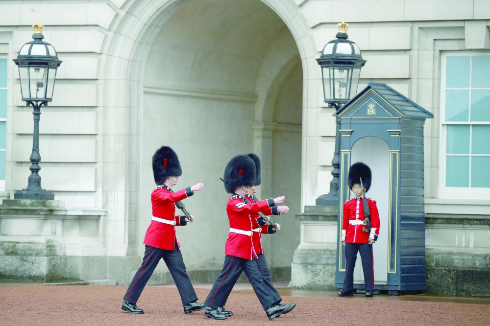 Guards patrol in the courtyard of Buckingham palace, central London, on Thursday. Fears grew on September 8, 2022 for Queen Elizabeth II after Buckingham Palace said her doctors were "concerned" for her health and recommended that she remain under medical supervision. The 96-year-old head of state -- Britain's longest-serving monarch -- has been dogged by health problems since last October that have left her with difficulties walking and standing. — AFP