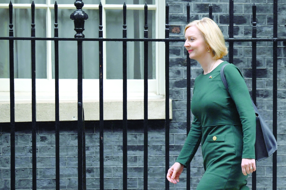 Britain will cap consumer energy bills for two years, its new leader Liz Truss said on Thursday. -- AFP