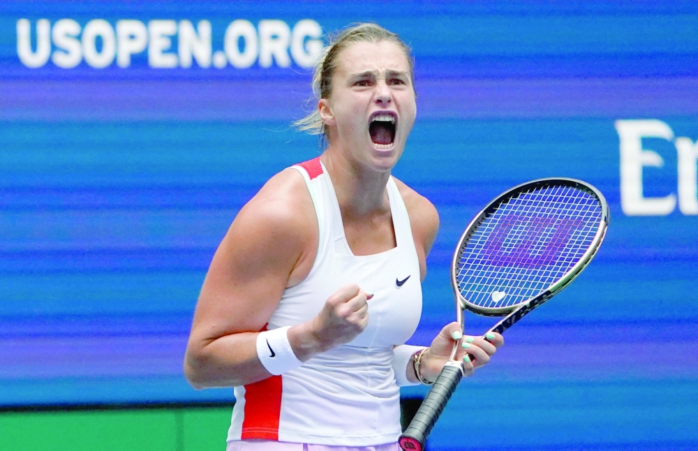 Belarus's Aryna Sabalenka celebrates her win against Czech Republic's Karolina Pliskova during their 2022 US Open Tennis tournament women's singles quarter-final match at the USTA Billie Jean King National Tennis Center in New York, on September 7, 2022.  (Photo by TIMOTHY A. CLARY / AFP)

