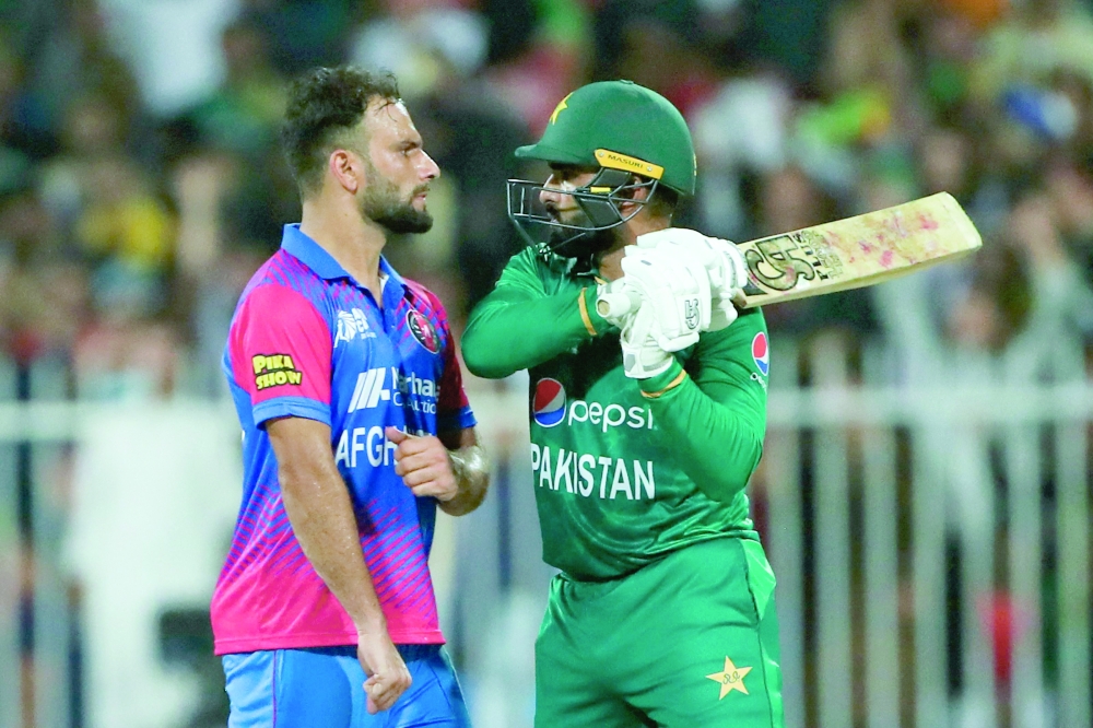 Pakistan's Asif Ali (R) and Afghanistan's Fareed Ahmad argue after a dismissal during the Asia Cup Super Four match in Sharjah. -- AFP

