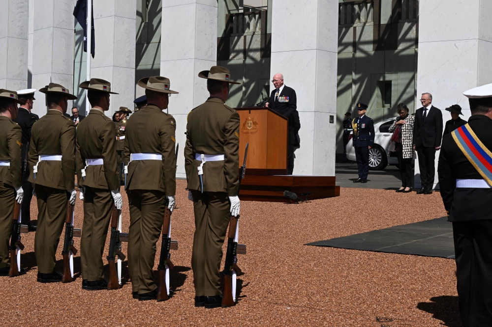 Australia's Prime Minister Anthony Albanese (3rd R) and Governor-General David Hurley (C) attend a Proclamation of Accession ceremony for Britain's King Charles III at Parliament House in Canberra on September 11, 2022. King Charles III pledged to follow his mother's example of "lifelong service" in his inaugural address to Britain and the Commonwealth on September 10, after ascending to the throne following the death of Queen Elizabeth II on September 8. (Photo by MICK TSIKAS / POOL / AFP)