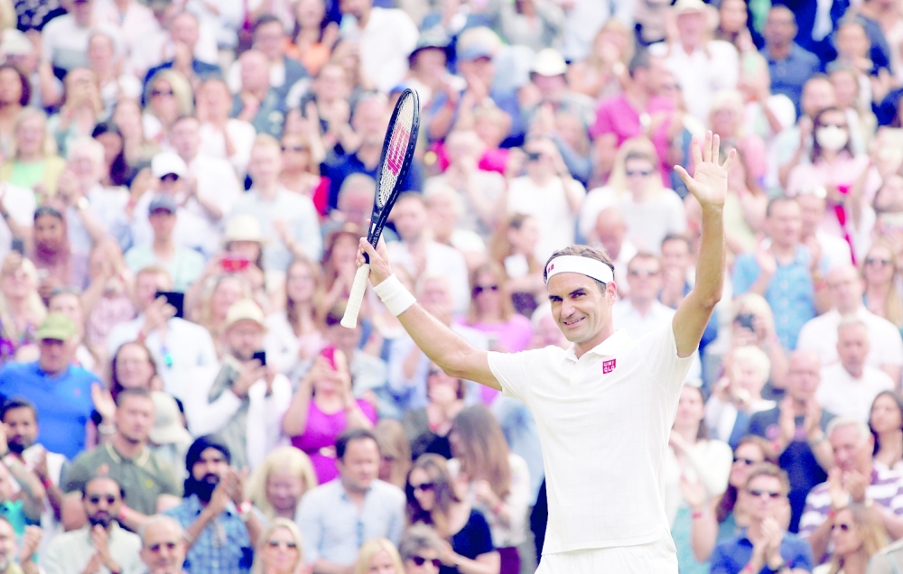 FILE PHOTO: Tennis - Wimbledon - All England Lawn Tennis and Croquet Club, London, Britain - July 1, 2021 Switzerland's Roger Federer celebrates winning his second round match against France's Richard Gasquet REUTERS/Paul Childs/File Photo
