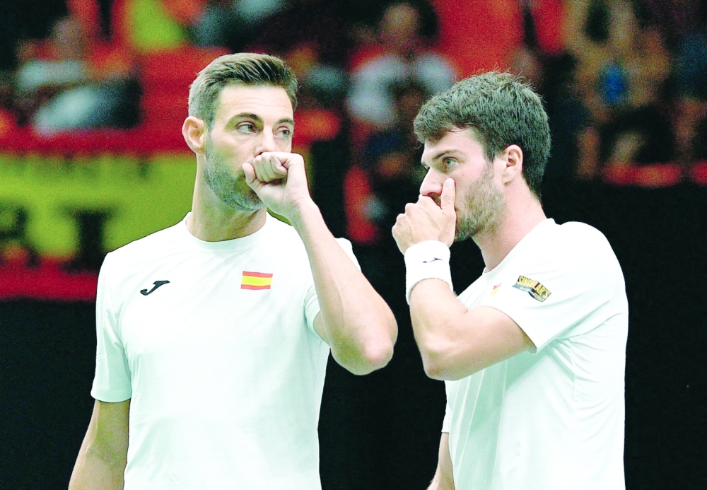Tennis - Davis Cup - Group B - Spain v Canada - Pavello Municipal Font de Sant Lluis, Valencia, Spain - September 16, 2022   Spain's Marcel Granollers and Pedro Martinez during the match against Canada's Felix Auger Aliassime and Vasek Pospisil REUTERS/Pablo Morano
