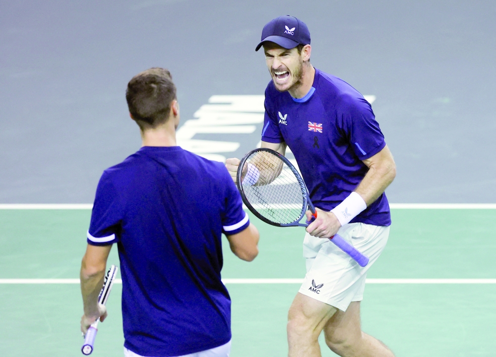 Tennis - Davis Cup - Group D - Great Britain v Netherlands - Emirates Arena, Glasgow, Scotland, Britain - September 16, 2022  Britain's Andy Murray and Joe Salisbury react during their match against Netherlands' Wesley Koolhof and Matwe Middelkoop Action Images via Reuters/Lee Smith

