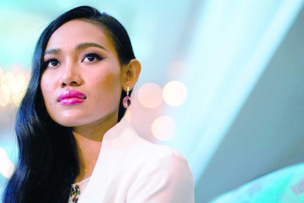 Han Lay appeals for help after being refused entry to Thailand by immigration officials. -- Reuters