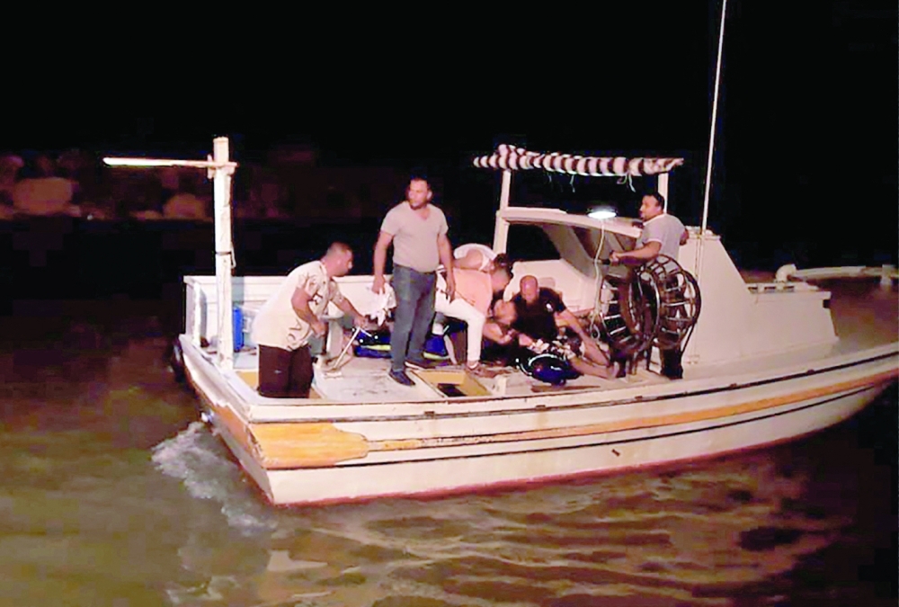 Rescuers search for victims and survivors off the coast of Syria's southern port city of Tartus, after a boat carrying migrants from Lebanon capsized in the Mediterranean sea. -- AFP