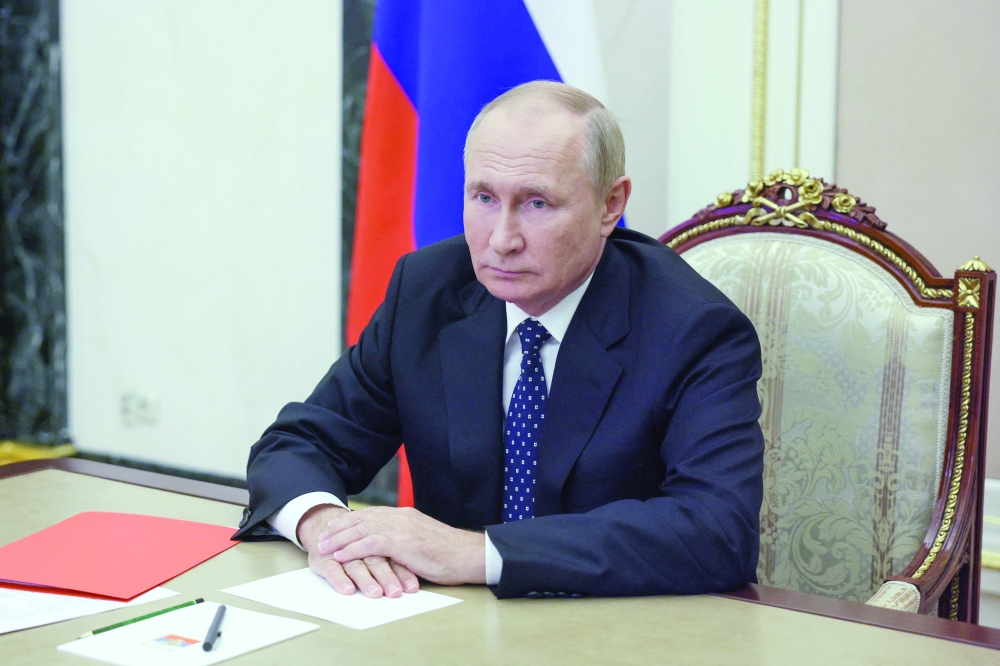 Russian President Vladimir Putin chairs a Security Council meeting via a video link in Moscow. - AFP


