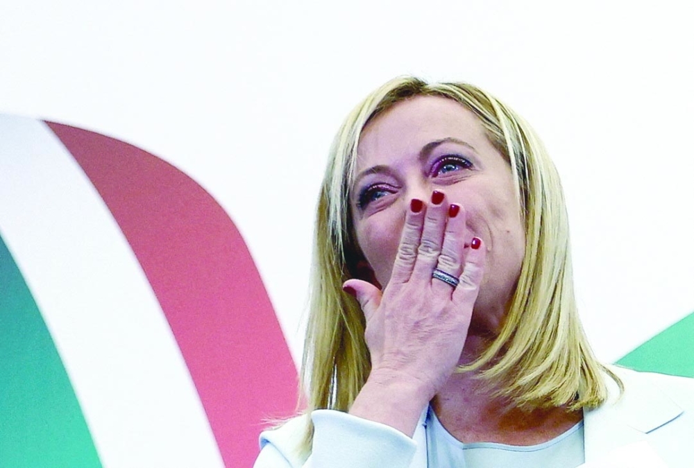 Leader of Brothers of Italy Giorgia Meloni reacts at the party's election night headquarters in Rome. - Reuters
