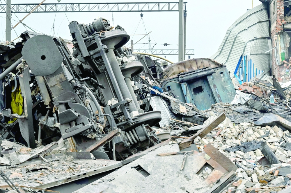 A rubble at a railway yard of the freight railway station in Kharkiv, which was partially destroyed by a missile strike. - AFP
