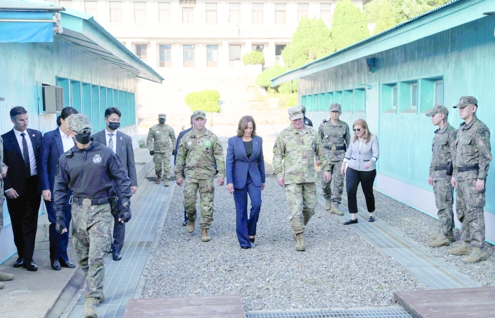 US Vice President Kamala Harris walks towards the demarcation line at the demilitarized zone (DMZ) separating North and South Korea, in Panmunjom. -- AFP