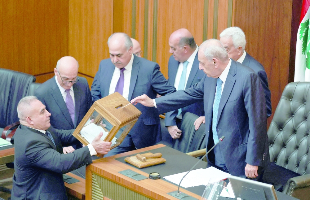 Lebanese Parliament Speaker Nabih Berri casts his vote during the first session to elect a new president at the parliament building in Beirut. -- Reuters