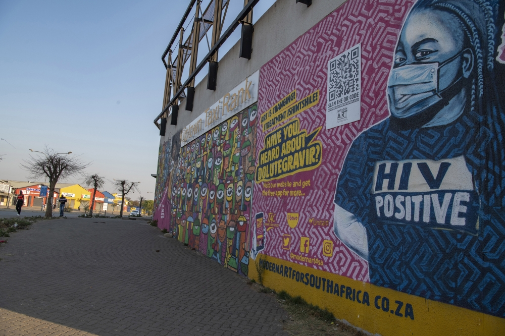 Street art encouraging HIV treatment on the walls of a taxi station in Kliptown, a suburb of Soweto, South Africa, on Aug. 28, 2022. (Ihsaan Haffejee/The New York Times)