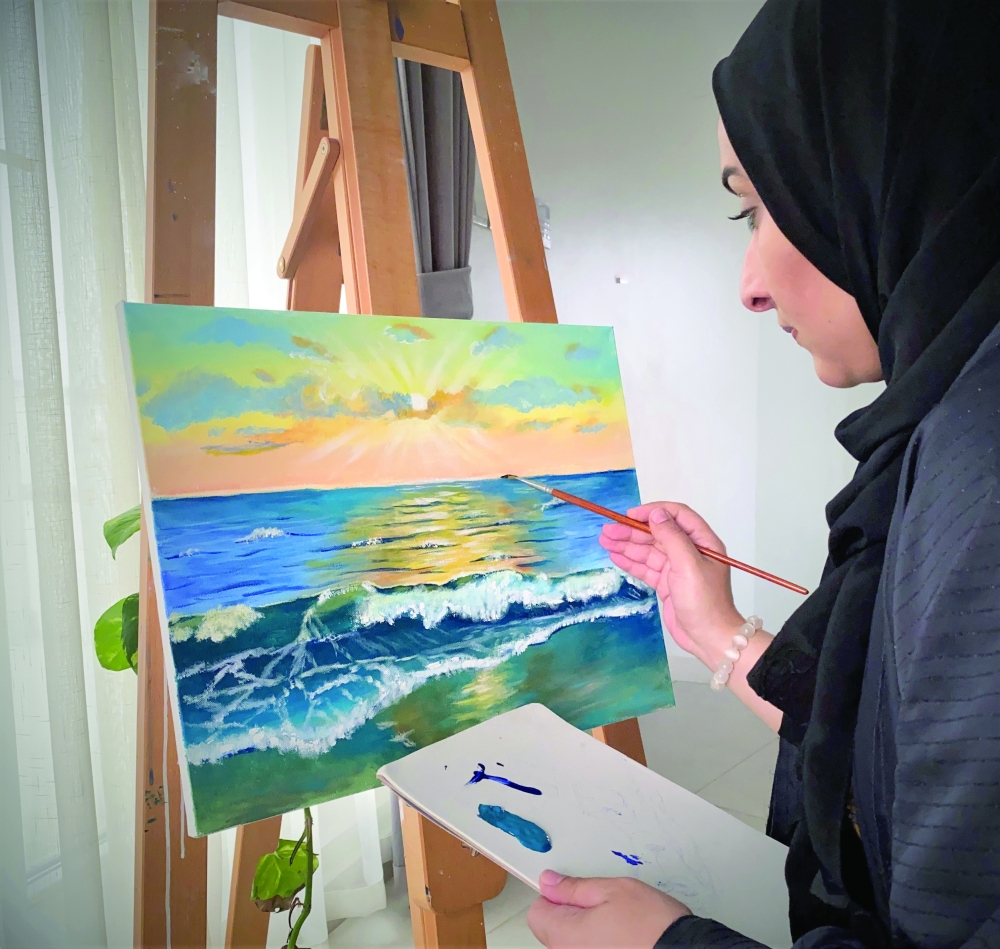 Bushra al Busaidi busy on a canvas