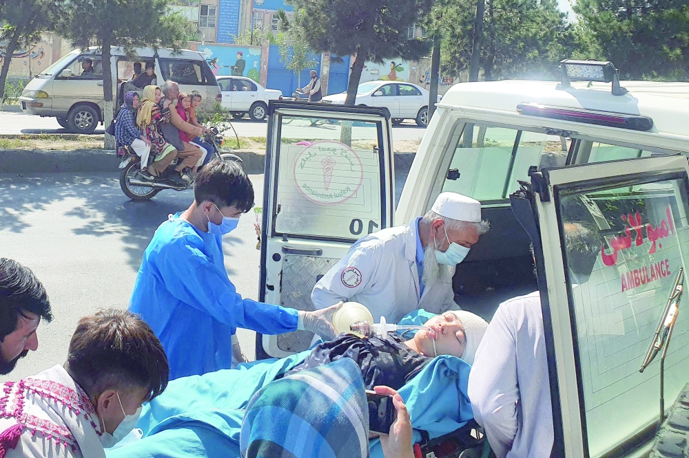 Families rushed to hospitals where ambulances arrived with victims, and lists of those confirmed dead or wounded were posted on the walls. -- AFP