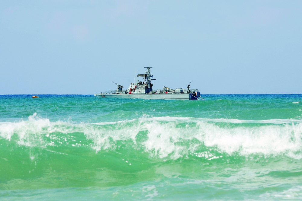 An Israeli Navy vessel is moored in Mediterranean waters off Israel’s crossing at Rosh Hanikra, known in Lebanon as Ras al Naqura. — AFP