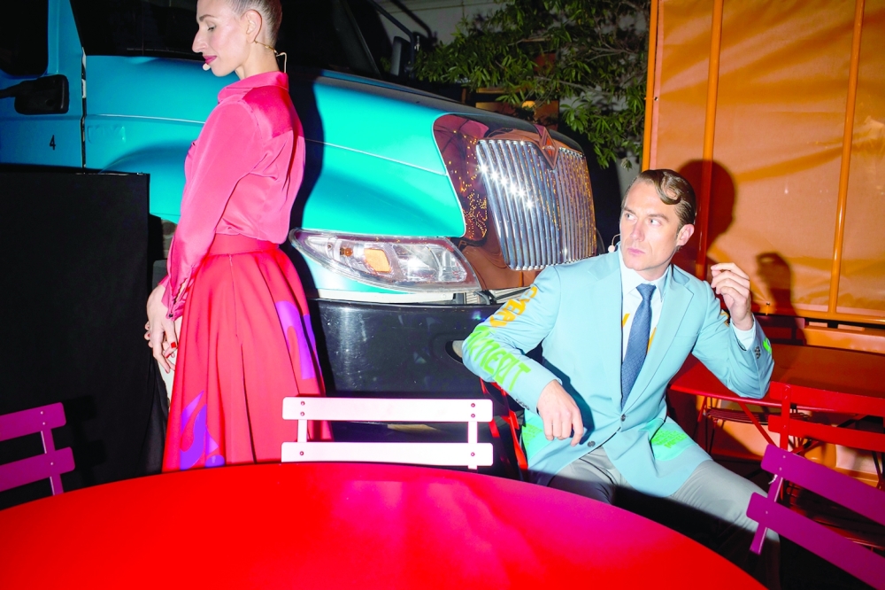 Actors in the musical performance, Love Around the Block, centered around a young couple, Joanna and Max, at the opening of the new Herms flagship store in Manhattan, Sept. 29, 2022. (Landon Nordeman/The New York Times)