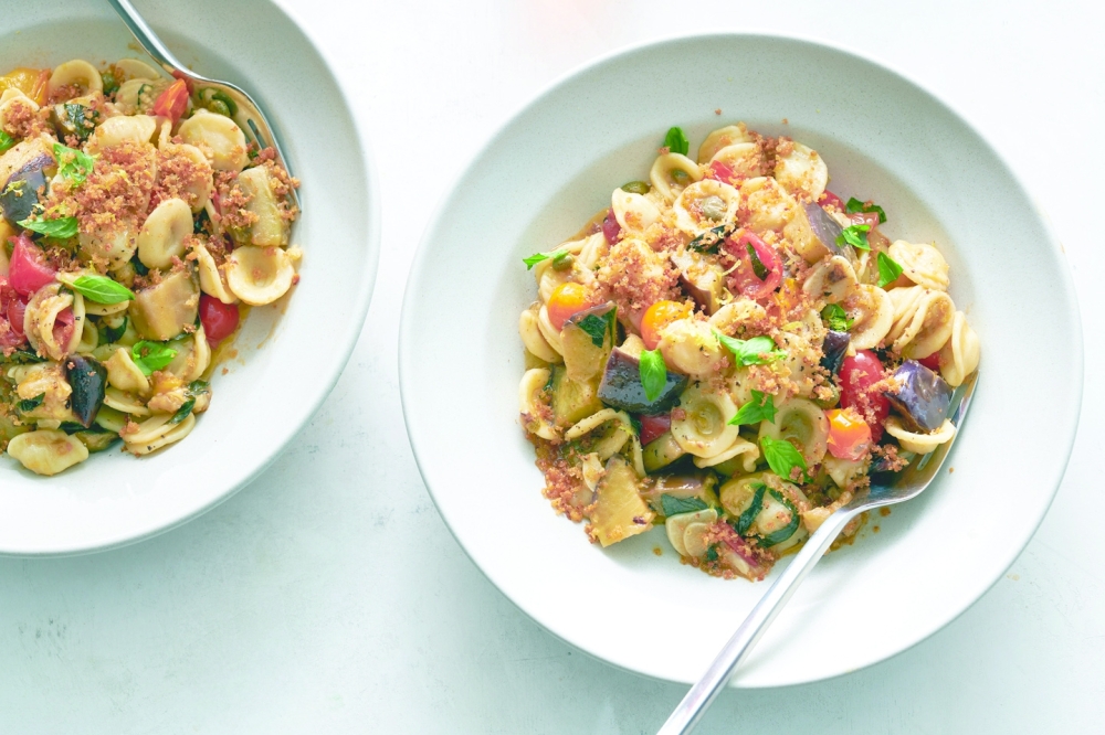 Eggplant pasta with anchovy bread crumbs and capers, in New York, Aug. 4, 2022. Food styled by Simon Andrews. (David Malosh/The New York Times)
