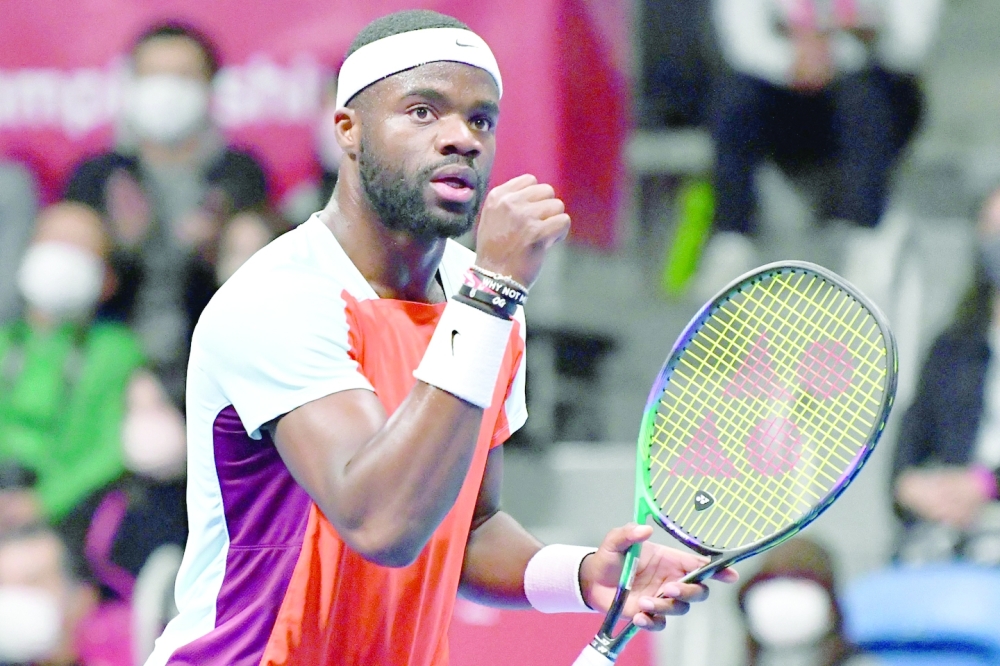 Frances Tiafoe of the US reacts during his men's singles quarterfinal match against Miomir Kecmanovic of Serbia at the Japan Open tennis tournament in Tokyo on October 7, 2022.  (Photo by Kazuhiro NOGI / AFP)