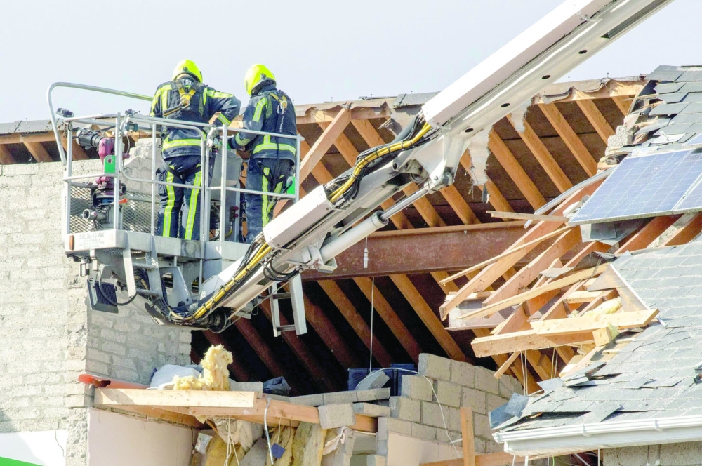 Emergency services attend the scene following an explosion in Creeslough, in the north west of Ireland. - AFP 
