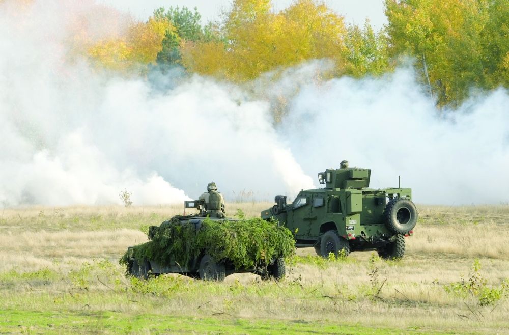 Lithuanian members of the military attend a Nato enhanced Forward Presence German-led battle group military exercise, near Rukla, Lithuania. - Reuters
