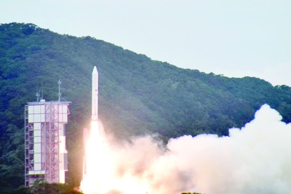 The Epsilon rocket No 6 takes off from the launch pad at the Uchinoura Space Center in Kimotsuki-gun, Kagoshima Prefecture. - AFP